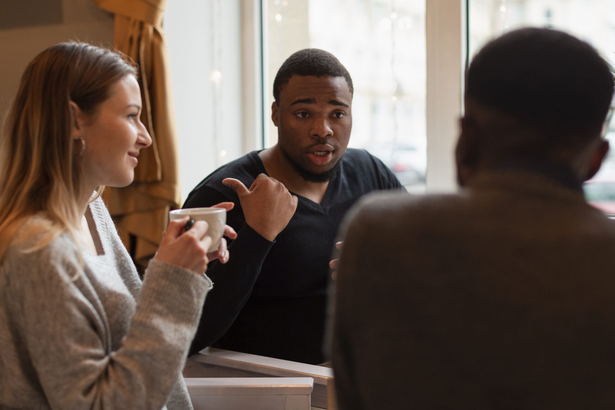 Three people talking about the differences between a therapist vs life coach